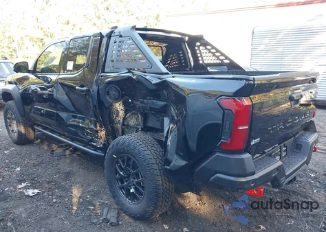 2025 Toyota Tacoma Hybrid Trailhunter from USA, damaged, VIN 3TYLC5LN0ST039894